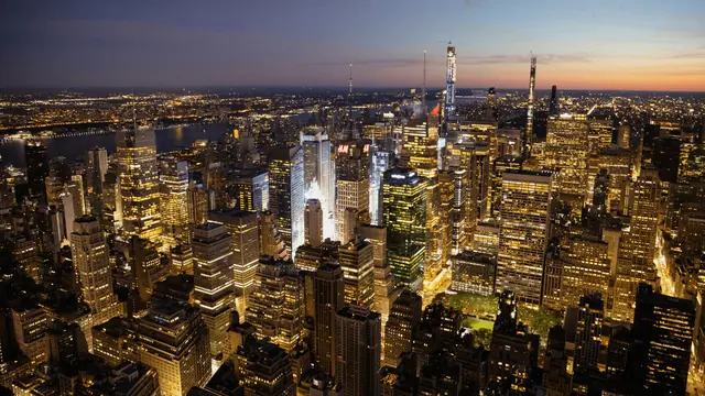 Midtown Manhattan illuminated at dusk, viewed from the Empire State Building