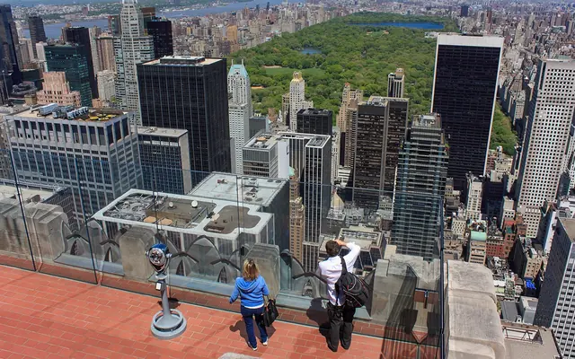 Visitors on a Top of the Rock terrace looking north towards Central Park